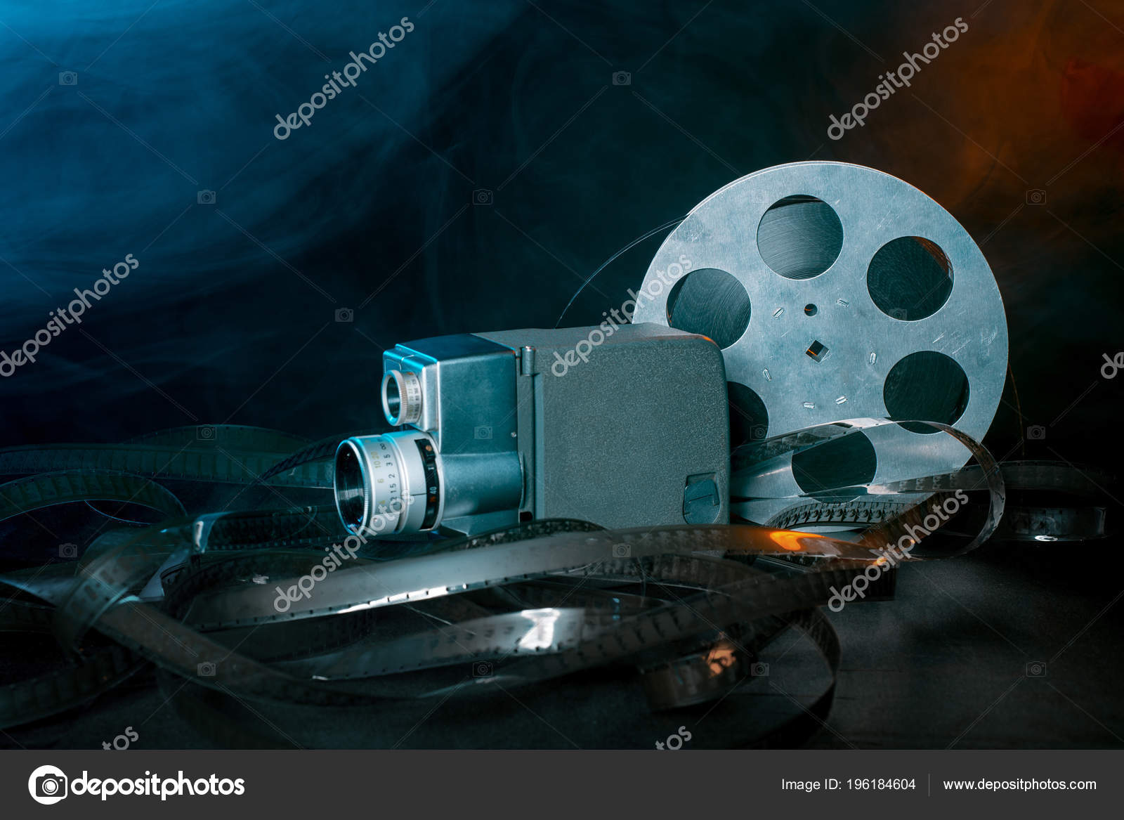 Movie Camera Reel Film Smoke Dark Background Stock Photo by
