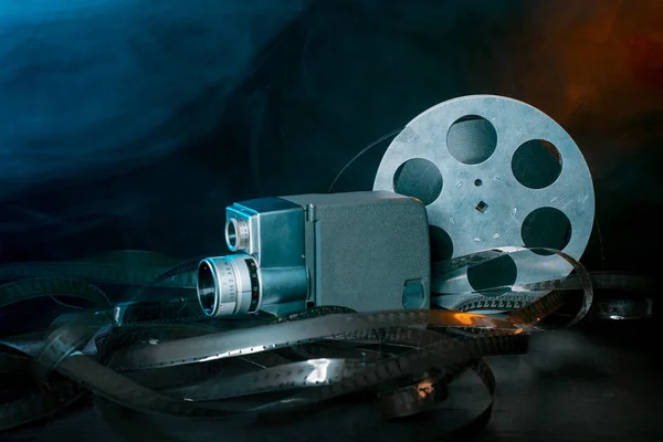 Movie Camera Reel Film Smoke Dark Background — Stock Photo, Image