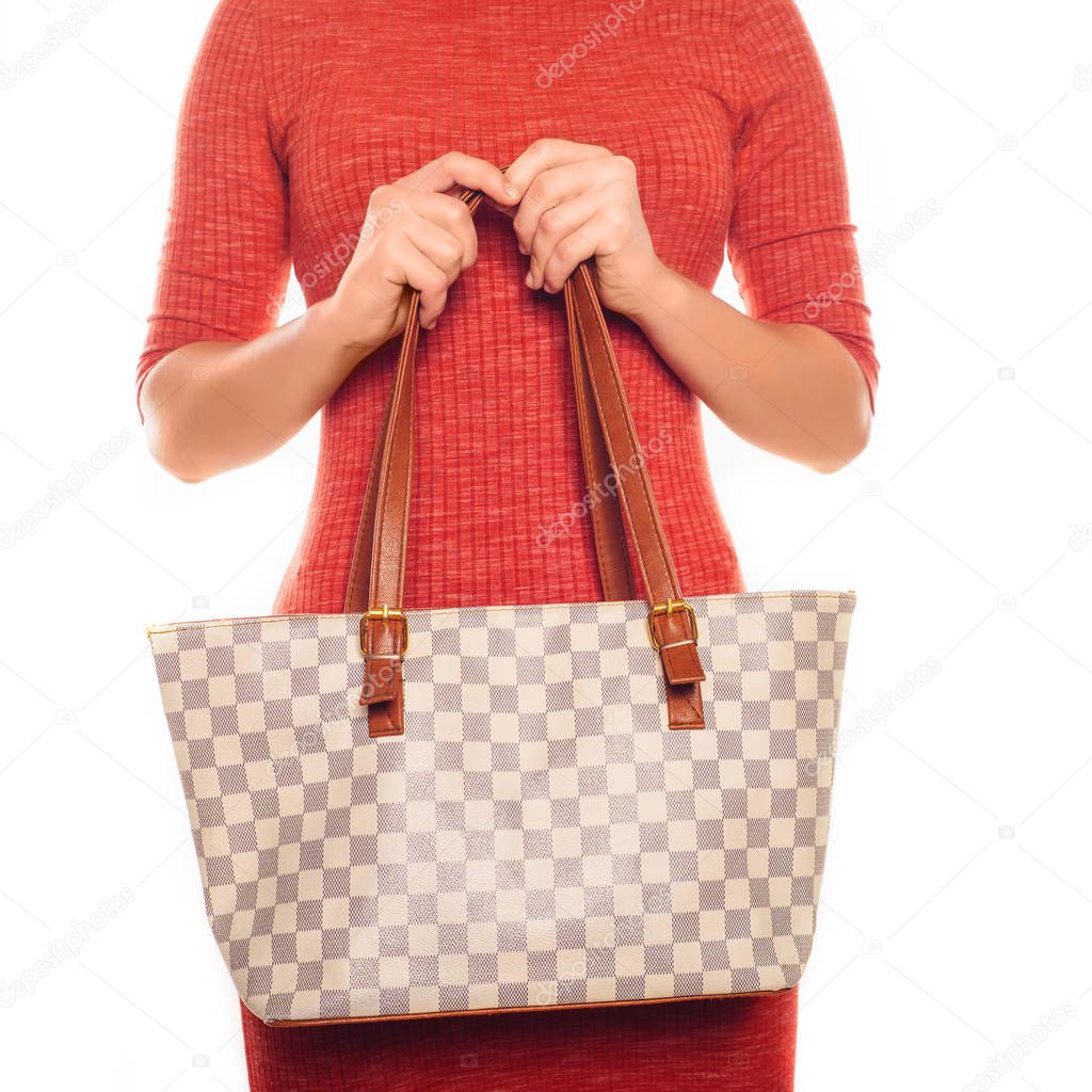 picture of lovely woman in red dress with fashionable checkered bag