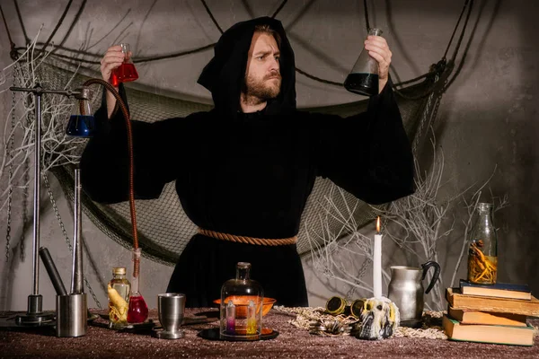 Medieval Alchemist Scientist Magician Looks Flasks His Laboratory Halloween Concept — Stock Photo, Image
