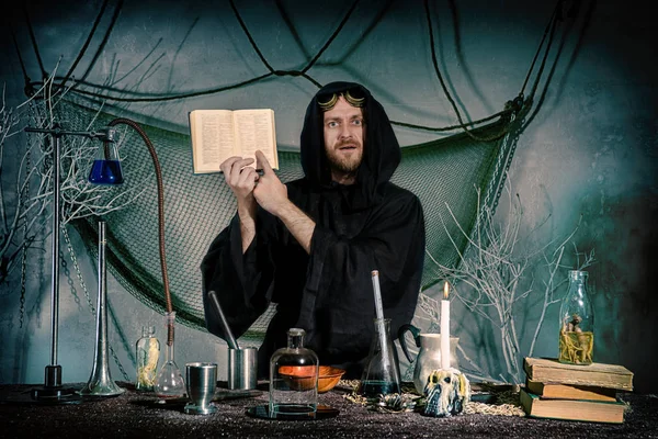 Portrait Crazy Alchemist Medieval Scientist Indicates Text Recipe Book Halloween — Stock Photo, Image