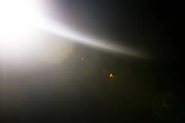 Flash of a distant abstract star. Abstract sun flare. The lens flare is subject to digital correction. — Stock Photo, Image