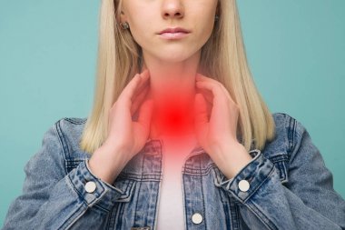 A young girl has a sore throat. Thyroid problems clipart