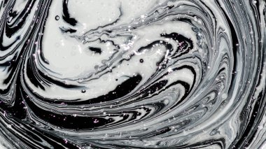 iki renk soyut görüntü karıştırma. Beyaz ve siyah boya dairelerinin dokusu