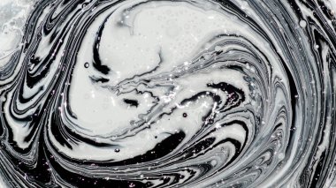 iki renk soyut görüntü karıştırma. Beyaz ve siyah boya dairelerinin dokusu