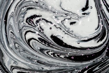 iki renk soyut görüntü karıştırma. Beyaz ve siyah boya dairelerinin dokusu