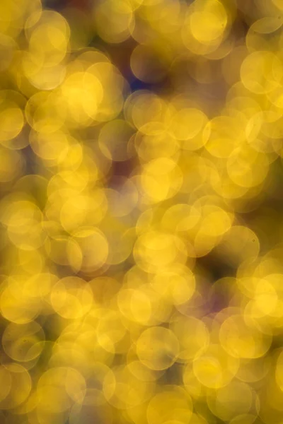 Abstract golden color lights chrismas background. de-focused - image