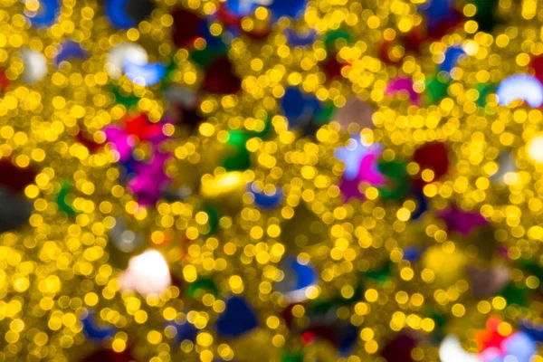 Abstract golden color lights chrismas background. de-focused - image