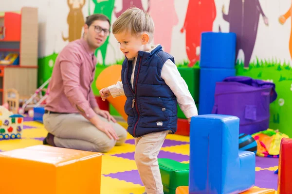 Side View Cute Little Boy Who Playing His Young Father — Stock Photo, Image