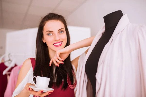 Smiling Happy Seamstress Relies Mannequin Keeps Cup Coffee Coffee Break — Stock Photo, Image