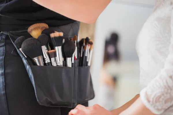 Brushes for makeup in the briefcase of makeup artist