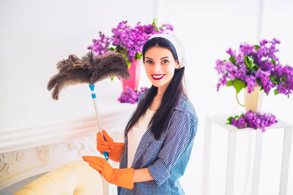 Young Divine Smiling Housewife Wipes Dust Furnitures Home — Stock Photo, Image