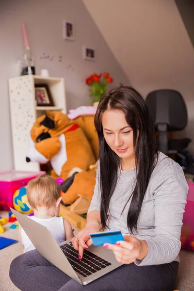 busy mom with credit card