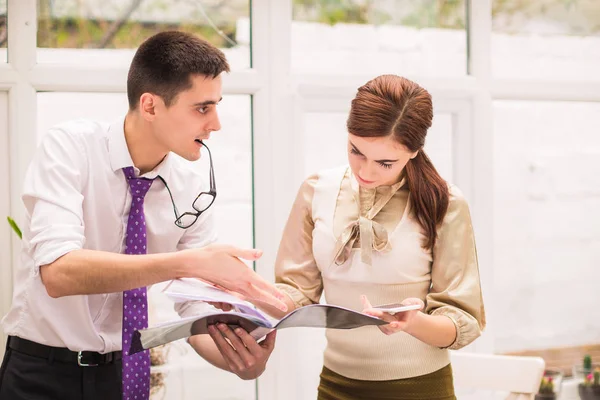 Young Businessman Stands His Assistant Shows Opened Folder Assistant Looks Stock Image