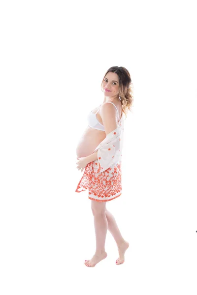 Young Joyful Pregnant Woman Stands White Background Keeps Hand Her — Stock Photo, Image