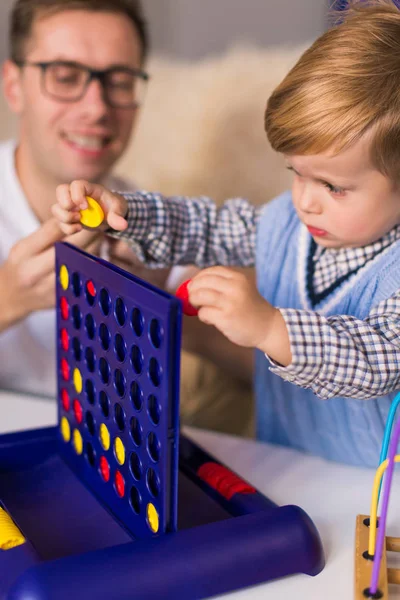 Portrait Little Cute Serious Boy Who Sitting Sofa Table Playing — Stock Photo, Image