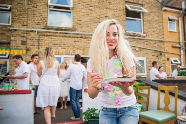 Young Smiling Woman Standing Home Party Outdoor Keeping Plate Food — Stock Photo, Image