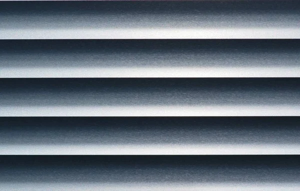 Abstract Monochrome Metal Blinds Straight Horizontal View Showing Contrasting Highlights — Stock Photo, Image