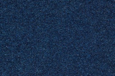 Ayrıntılı dokular gösteren bir mutfak süngerin kaba tarafı. Neredeyse derin mavi bir galaksi gibi görünüyor parlak yıldız bir güneş sistemi.