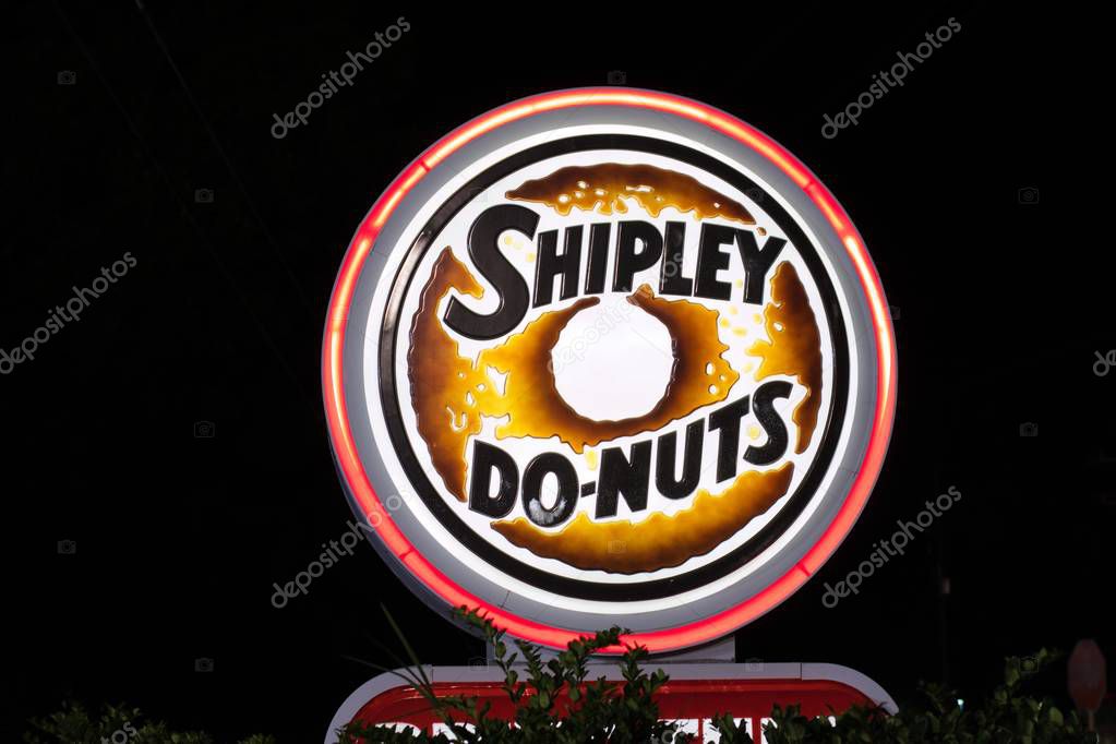 Houston, Texas/USA 09/29/2019: Neon Shipley Do-Nuts sign on Old Humble Rd in Humble, TX. Shipley Do-Nuts are iconic in the Southern US. Founded in Houston 1936 they are a household name in the South.