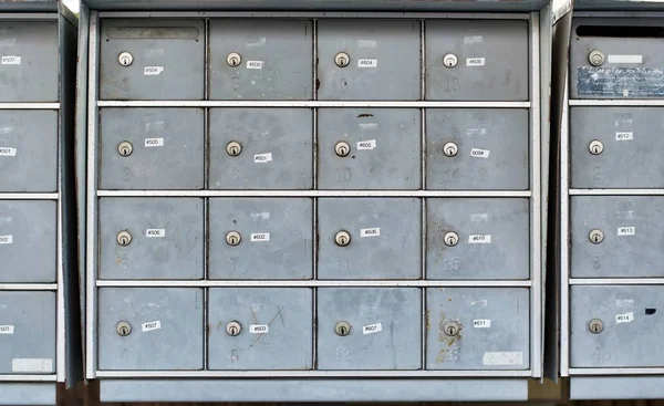 Apartment Mailboxes Lined Row Numbered Boxes Metal Appear Very Worn — Stock Photo, Image