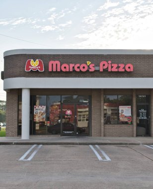 Houston, Texas USA 07-20-2025: Marcos Pizza restaurant business storefront exterior local diner.