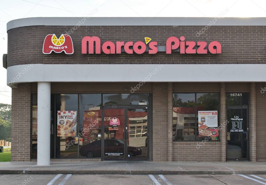 Houston, Texas USA 07-20-2025: Marcos Pizza restaurant business storefront exterior.