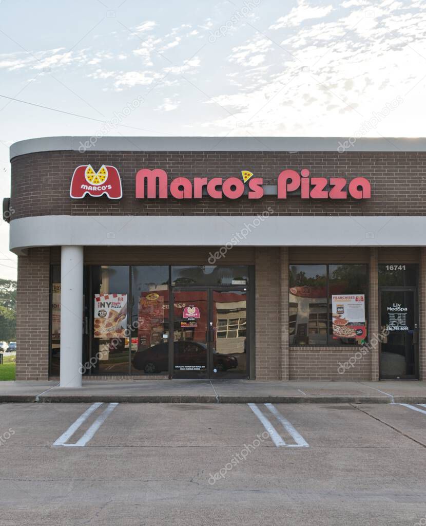 Houston, Texas USA 07-20-2025: Marcos Pizza restaurant business storefront exterior.