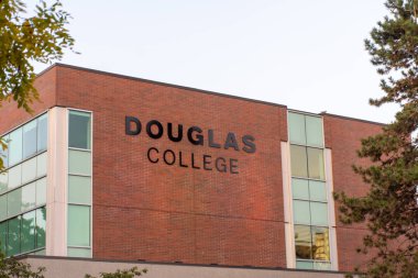 Douglas College campus view of sign and campus in New Westminster clipart
