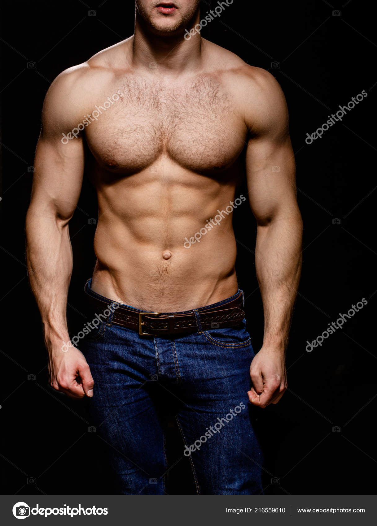 Fotografia do Stock: Torso muscular male body. Bodybuilder achievement  great shape. Sexy naked torso. Chest six pack muscles looks impressing  attractive sexy. Great body result of regular training workout gym  exercises