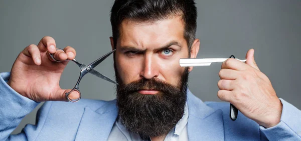 Beard man, bearded male. Portrait beard man. Barber scissors and straight razor, barber shop, suit. Vintage barbershop, shaving. Mustache men. Beard macho man. Brutal guy, scissors, straight razor