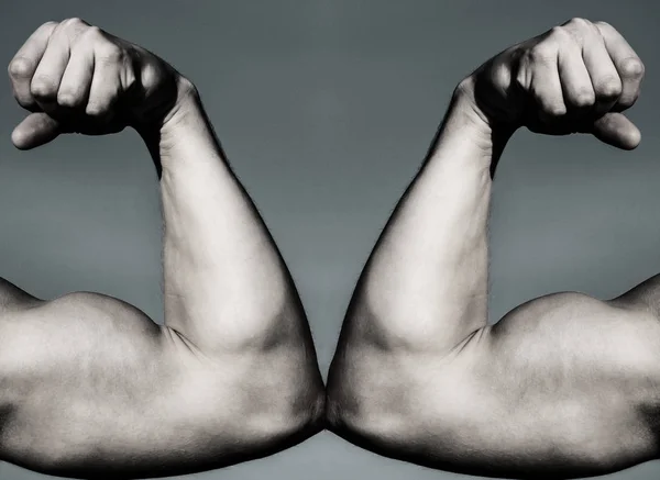 Vs. Fight hard. Health concept. Hand, man arm, fist. Muscular hand vs strong hand. Competition, strength compariso