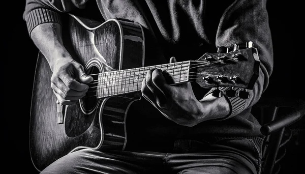 Music concept. Guitar acoustic. Play the guitar. Live music. Music festival. Instrument on stage, band. Electric guitar, guitarist, musician rock. Musical instrument. Guitars, strings. Black and whit — Stock Photo, Image