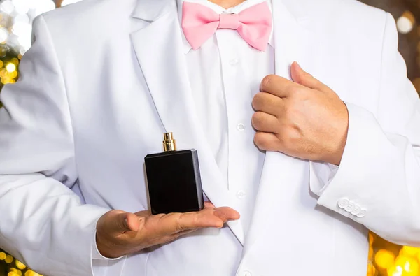 Male fragrance, perfumery, cosmetics. Smell perfume. Expensive suit. Rich man prefers expensive fragrance smell. Man scent perfume — Stock Photo, Image