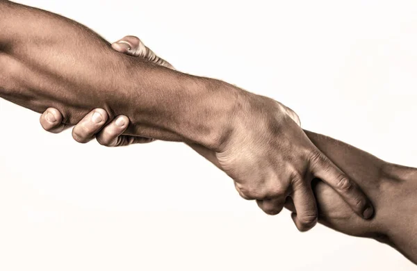 Twee handen, helpende arm van een vriend, teamwork. Helpende hand concept en internationale dag van vrede, steun. Hand uitgestrekt, geïsoleerde arm, redding. Sluit de helphand — Stockfoto
