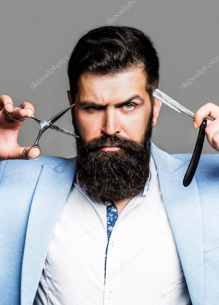 Barber scissors and straight razor, barber shop. Beard man, bearded male. Portrait beard man. Barber scissors and straight razor, barber shop, suit