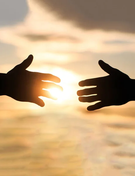 Echando una mano. Rescate, ayuda gesto o manos. Las manos extendidas, salvación, silueta de ayuda, concepto de ayuda —  Fotos de Stock