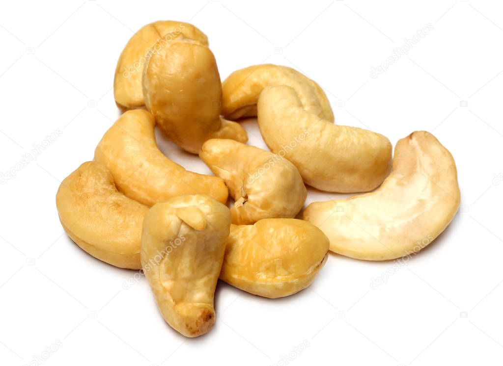 Cashew nuts over white background