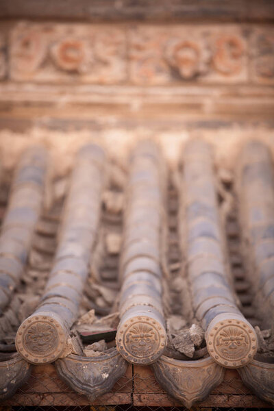 Color image of a roof of a Buddhist temple in Mongolia.