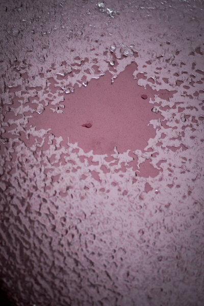 Крупный план мороза на капоте автомобиля
.