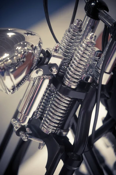 Motorcycle chrome headlight and front suspension — Stock Photo, Image