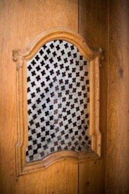 Wooden confessional in a church clipart