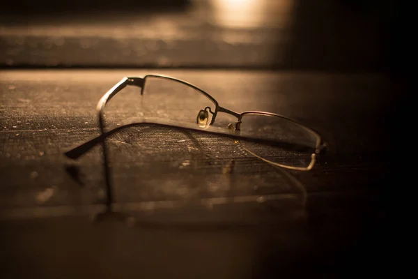 Glasses on a wooden table — Stock Photo, Image