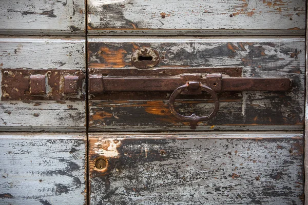 Vintage lock on a wooden door — Stock Photo, Image