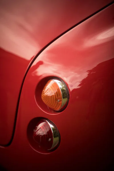 Red tail light of a classical vintage car