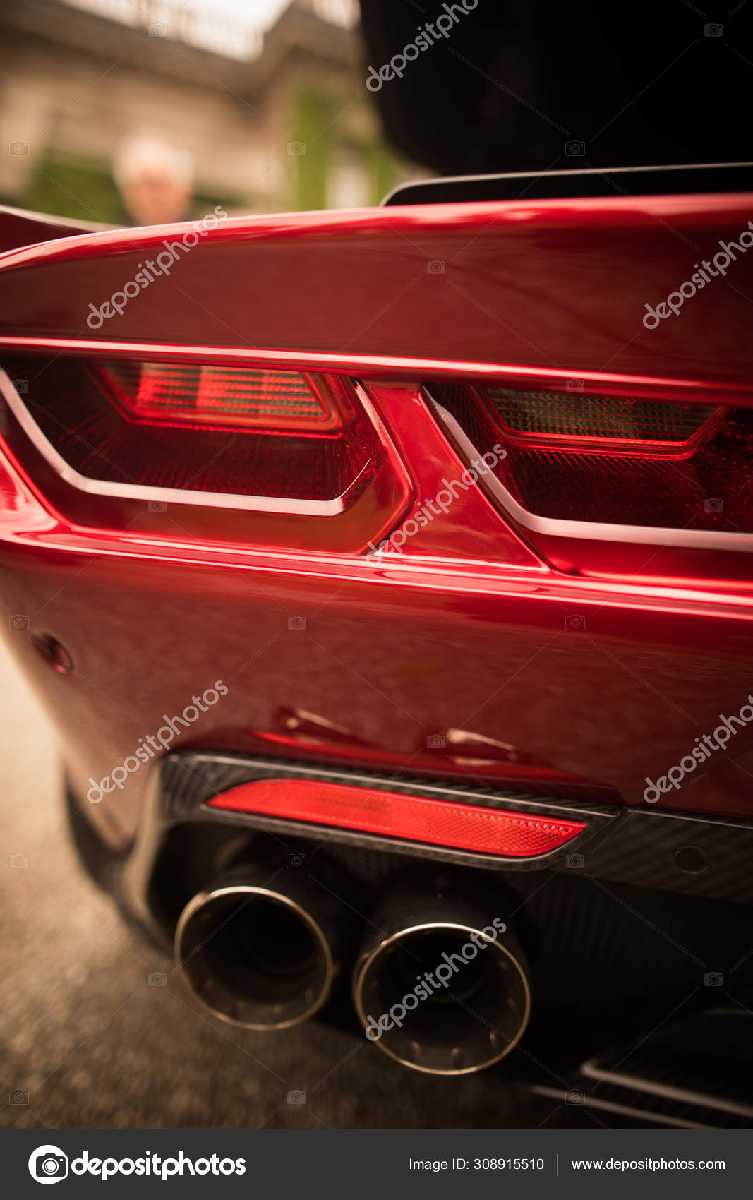Tail lights and exhaust of a supercar Stock Photo ©bizoon 308915510