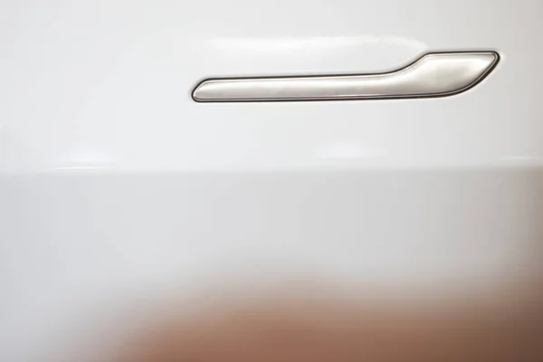 White car door handle