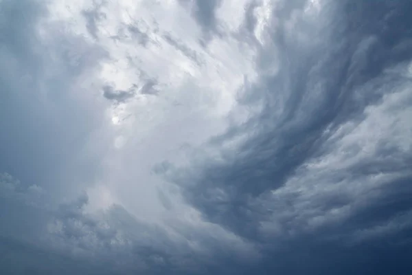 Rainy and stormy in dark clouds shadow make sky in black. The rain is coming soon.