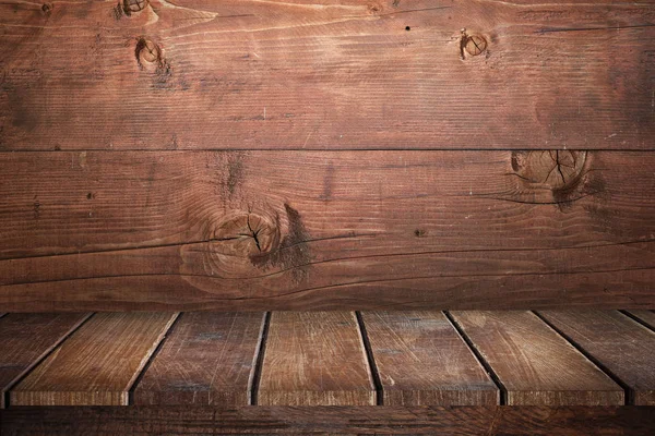 Fondo de marrón y mesa vieja desgastada de madera . —  Fotos de Stock