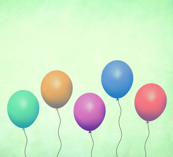 Colorful Vintage Retro Balloons on green grunge background.